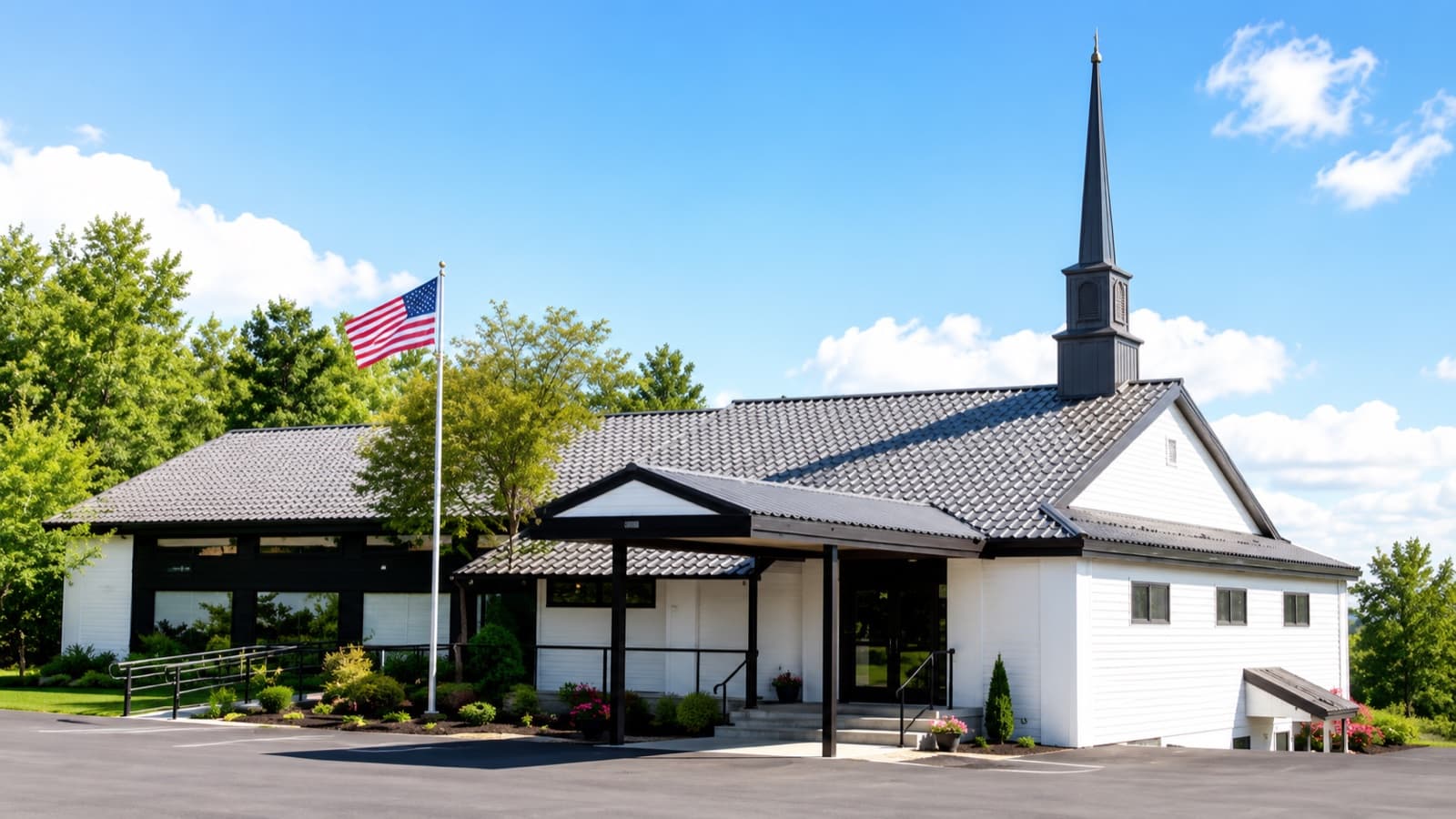 The white Independent Baptist Church building with its steeple on Route 22