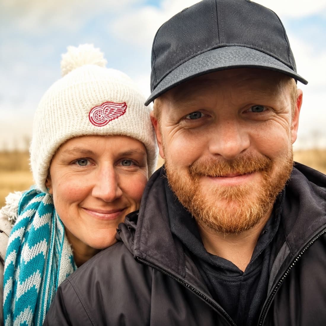 Pastor Kevin Bettinger and his wife Joan bundled up outdoors